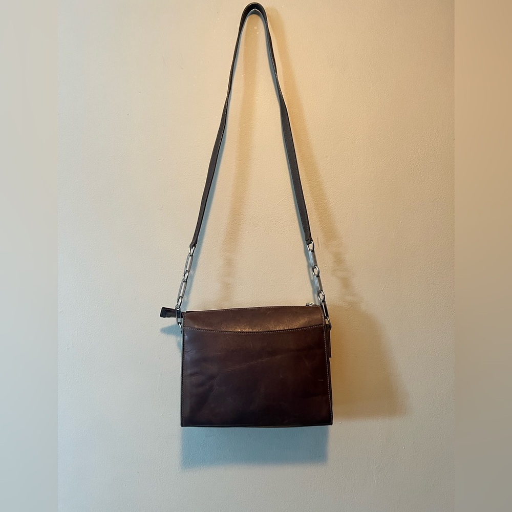 Mark Cross vintage leather cross body bag in chocolate brown. Zip top.